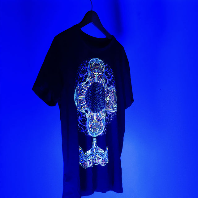 Silk screen printed t shirt featuring glow in the dark and uv active inks. 