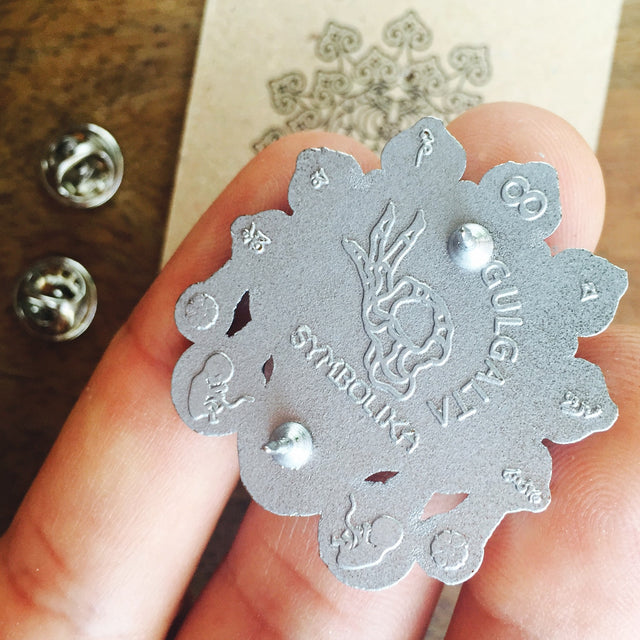 Gulgalta Black Lapel Pin - symbolika