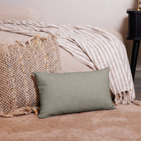 Almohada con patrón geométrico – Almog