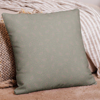 Almohada con patrón geométrico – Almog