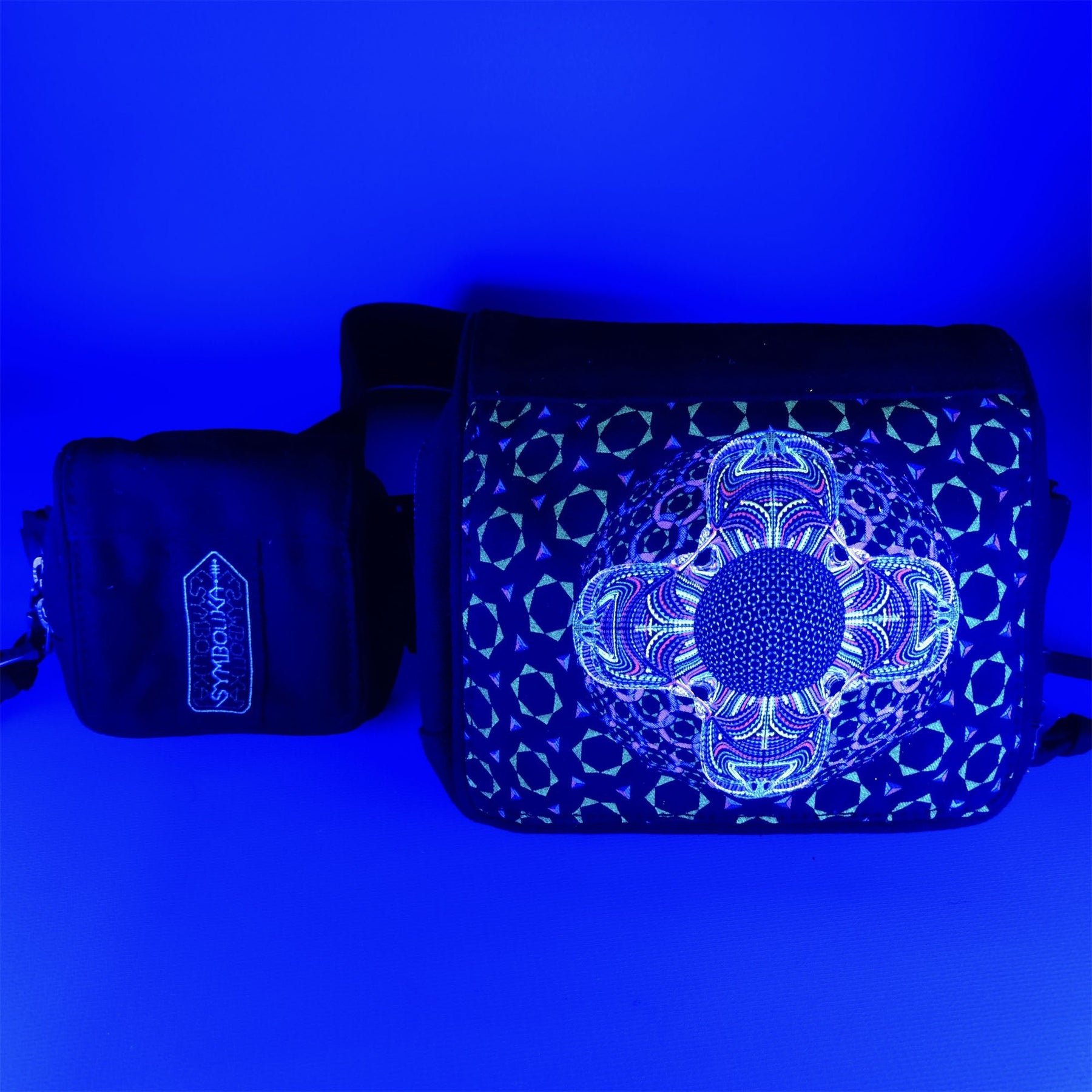 UV reactive belt bag glowing under blacklight - DMT visionary art