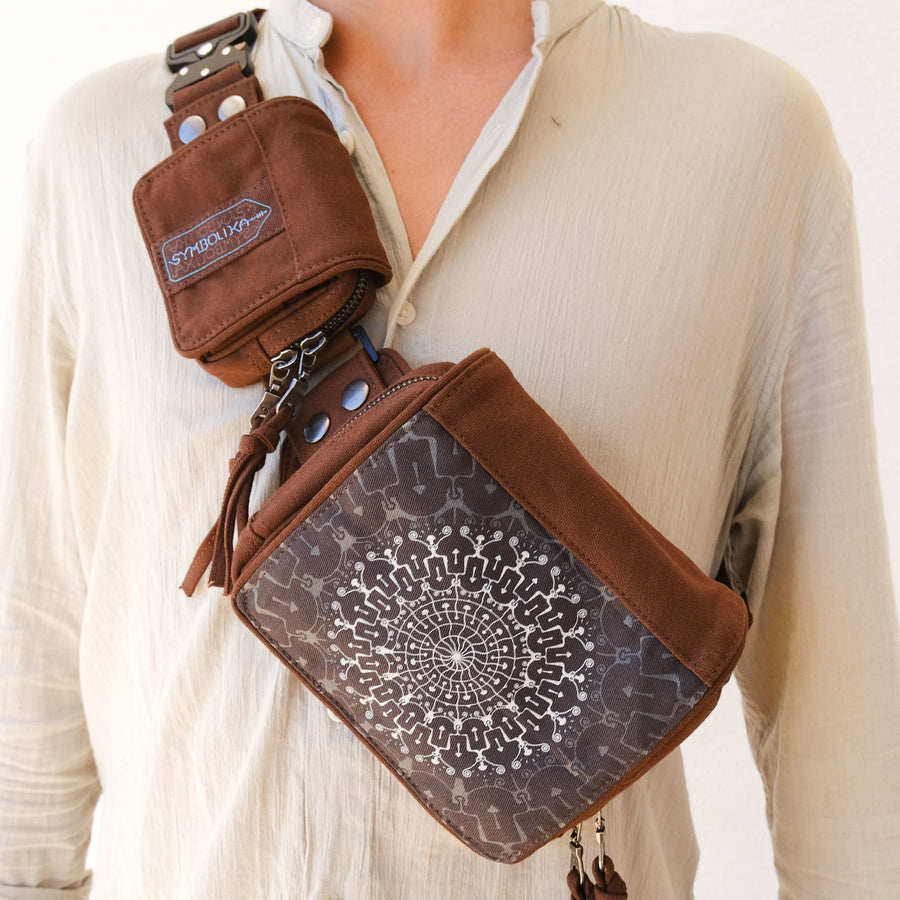 UV reactive mushroom mandala belt bag glowing under blacklight by Symbolika