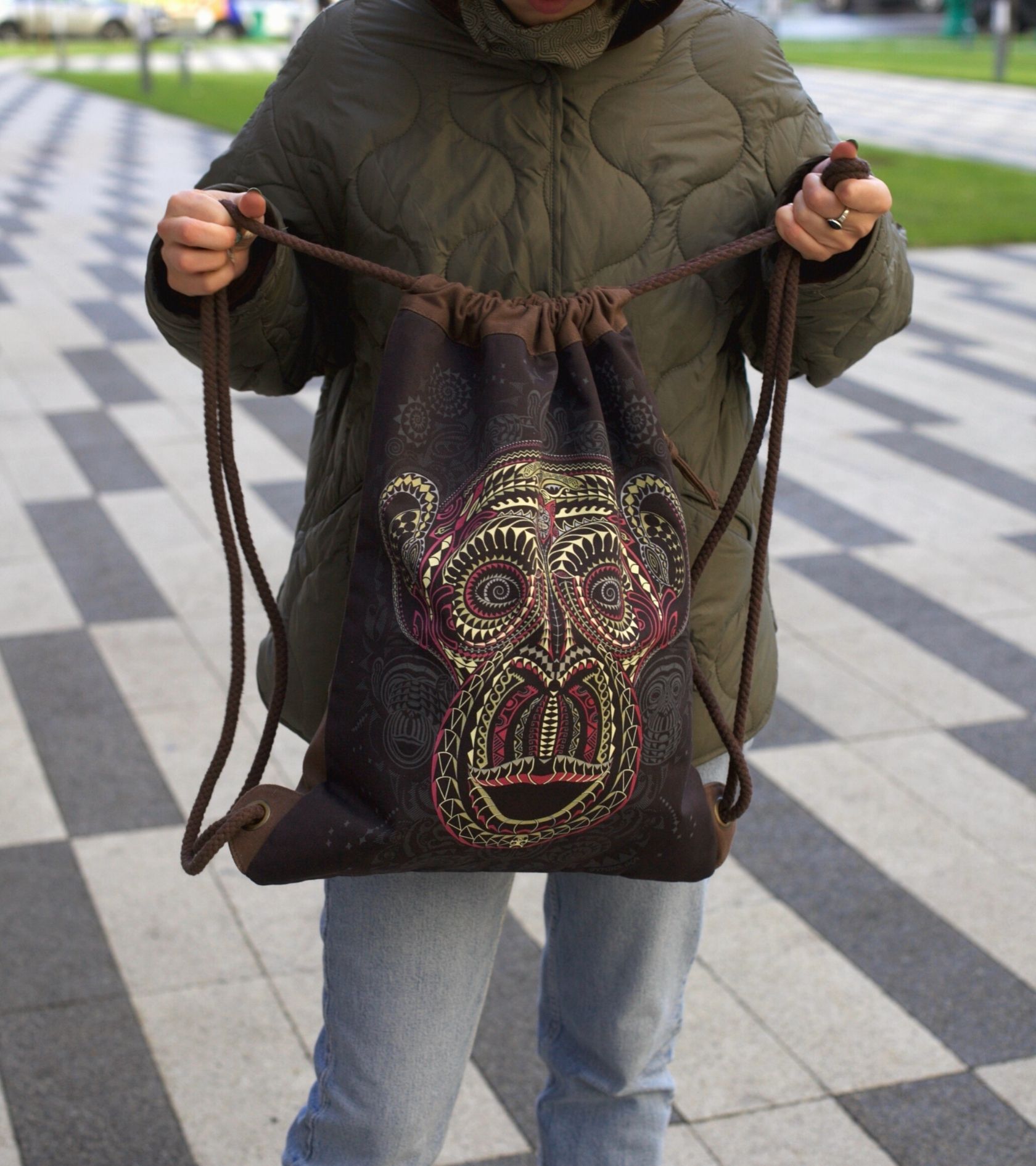 Tā Moko Drawstring Bag Psychedelic Art Print on Black T-Shirt by Symbolika