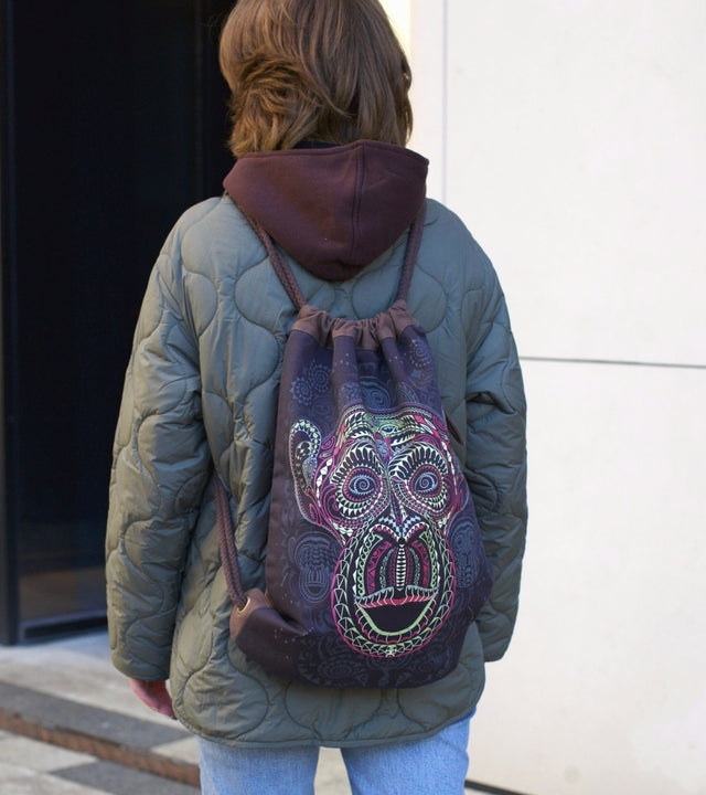 Ta Moko Drawstring Bag - Brown Canvas with UV Reactive Print