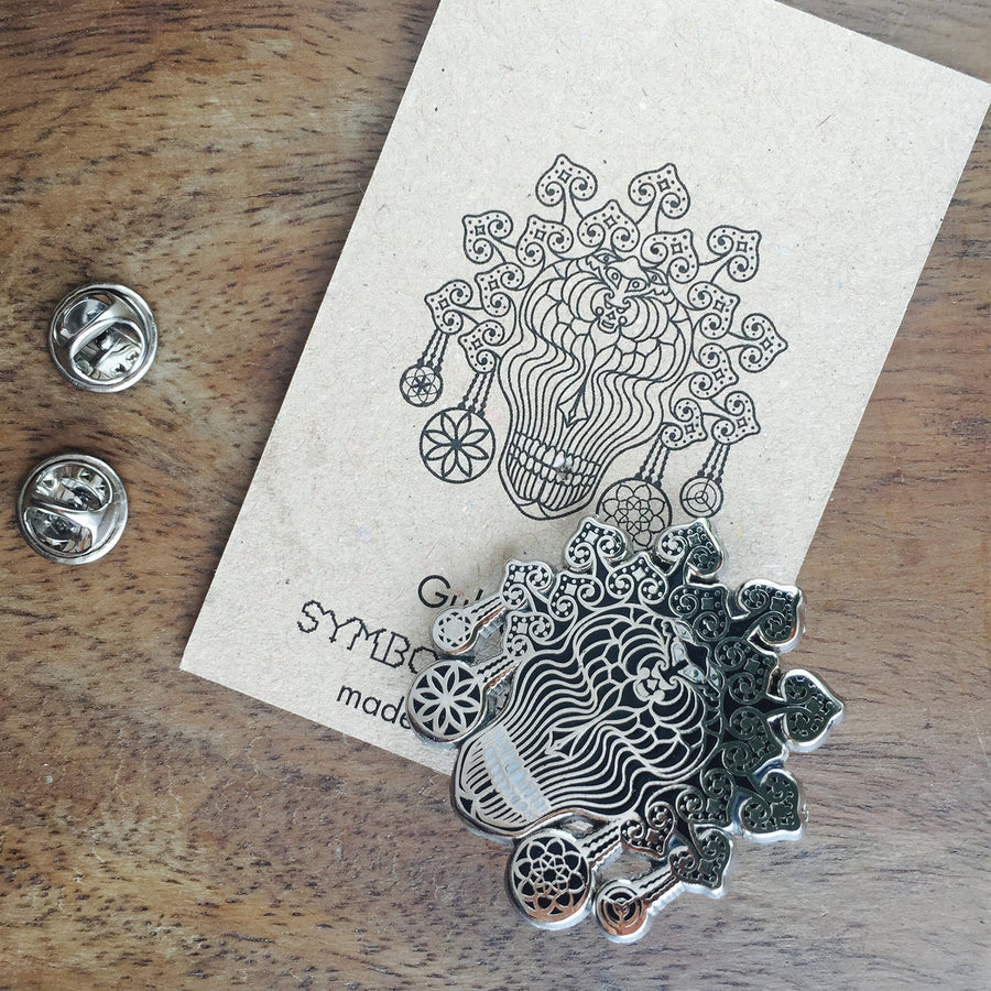 Gulgalta Black Lapel Pin - symbolika
