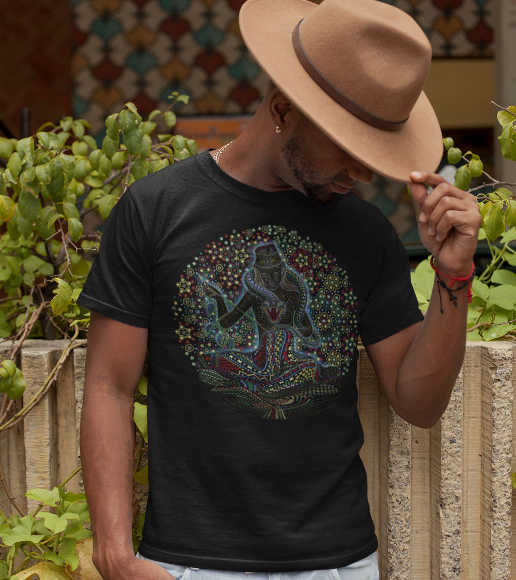 Song Weaving Mandala T-Shirt - mystical figure in lotus pose with serpentine energy patterns by Symbolika